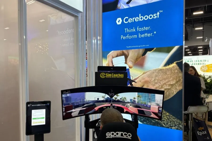 A race car simulation game at Givaudan's booth at SSG